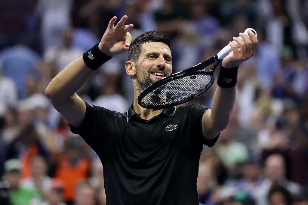 Nole y su clásico festejo del violín. (Foto: Getty).