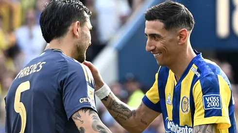 Leandro Paredes y Ángel Di María, durante el partido entre Boca y Rosario Central.