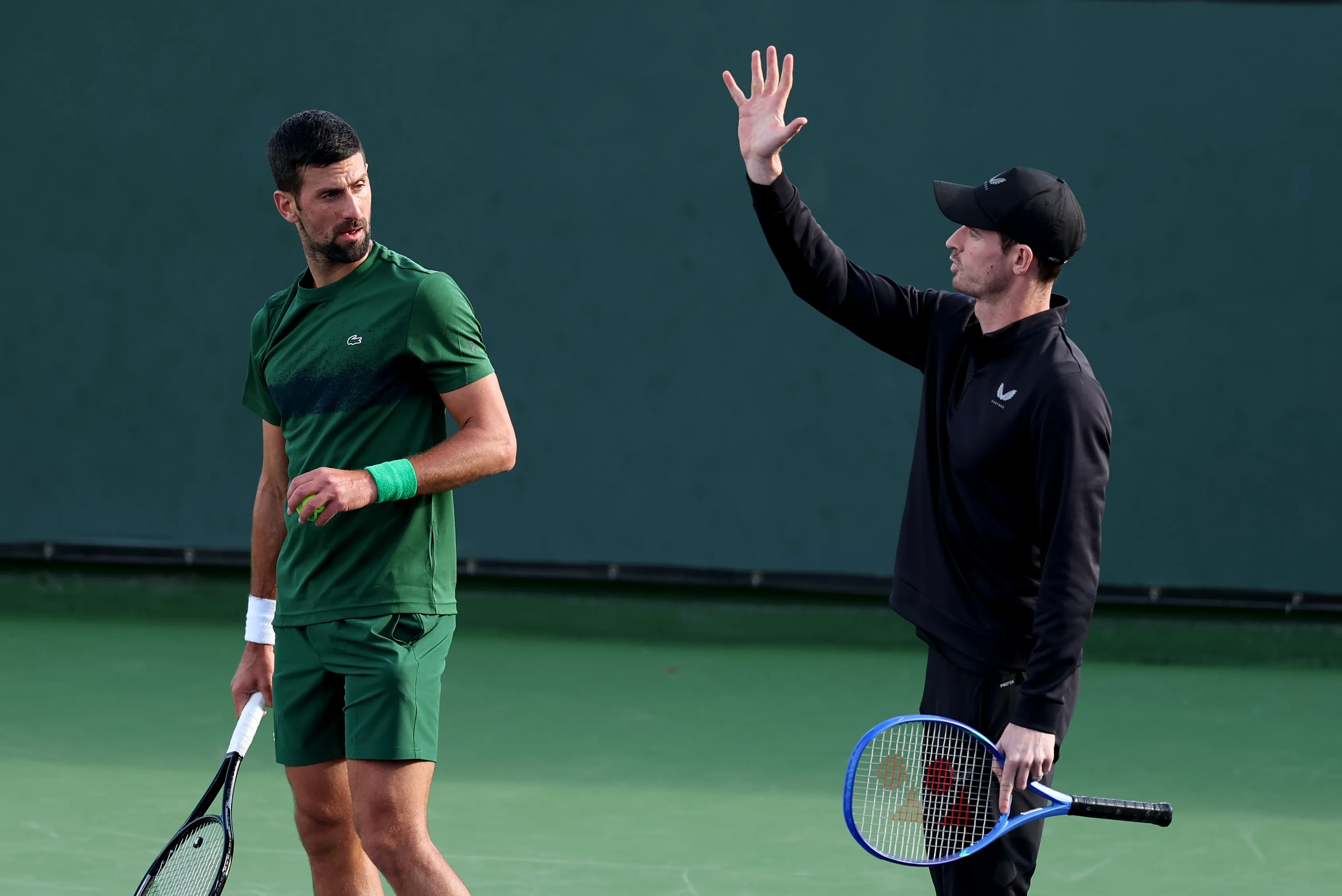 Novak Djokovic y Andy Murray, durante una práctica. (Getty Images)