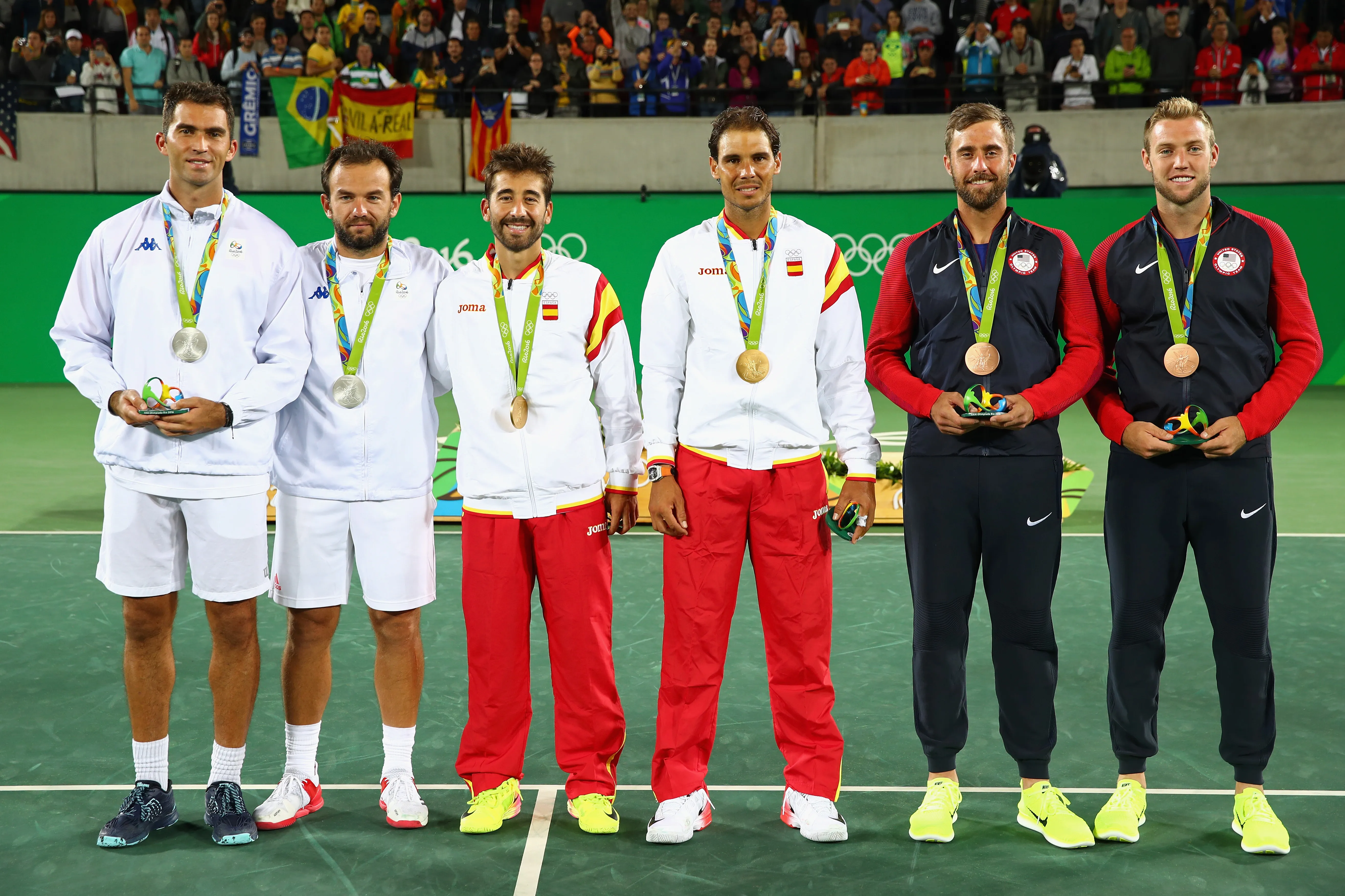 Horia Tecau y Florin Mergea de Rumania, Rafael Nadal y Marc Lopez de España y Steve Johnson y Jack Sock de Estados Unidos, medallistas en los Juegos Olímpicos de Rio de Janeiro 2016. (Getty Images)