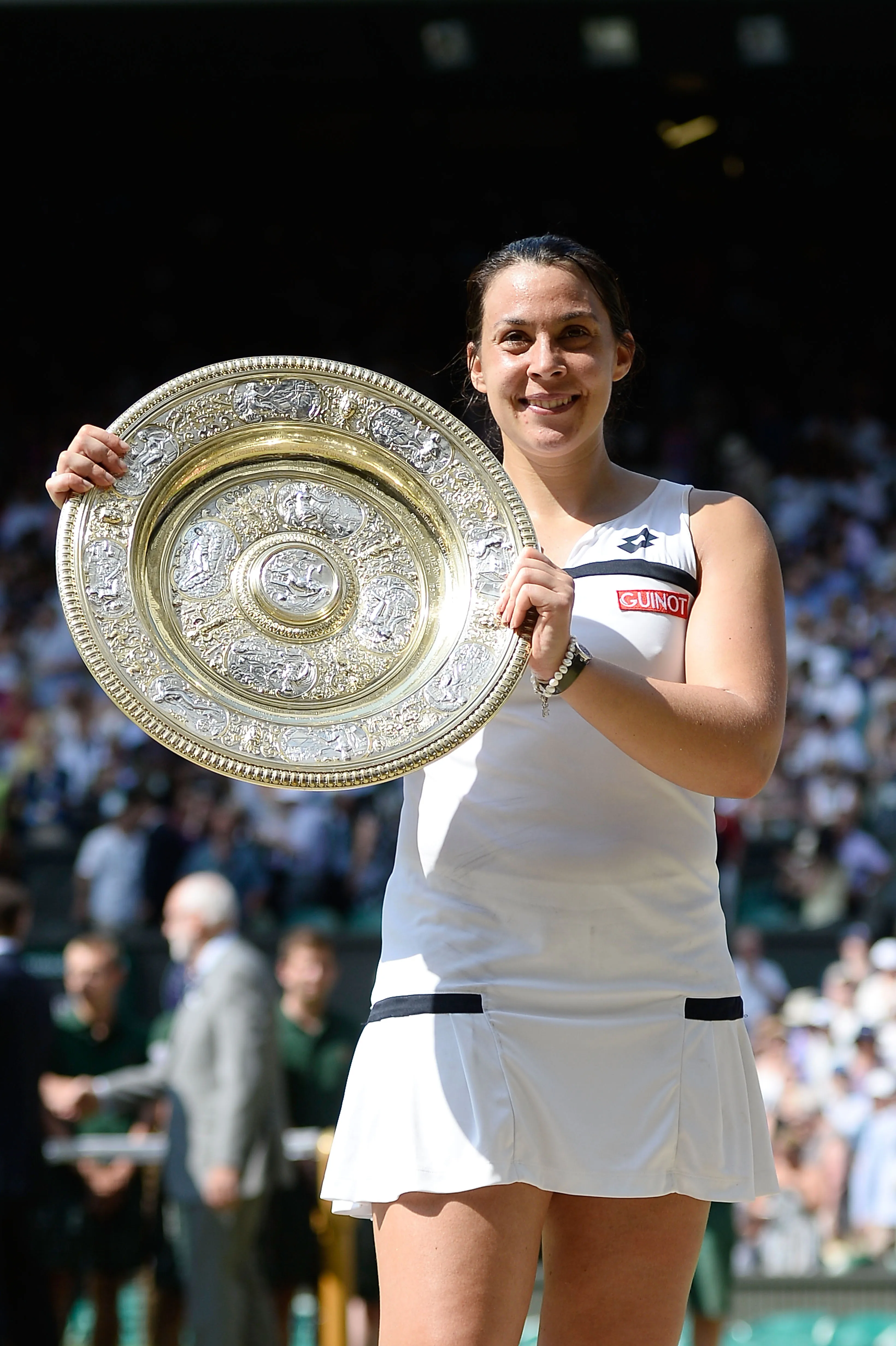Marion Bartoli tras ganar Wimbledon en 2013. (Foto: Getty).