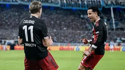 Facundo Colidio y Sebastián Driussi celebran la victoria ante Racing.