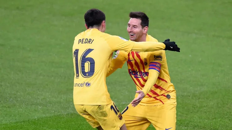 Pedri y Lionel Messi en el FC Barcelona.