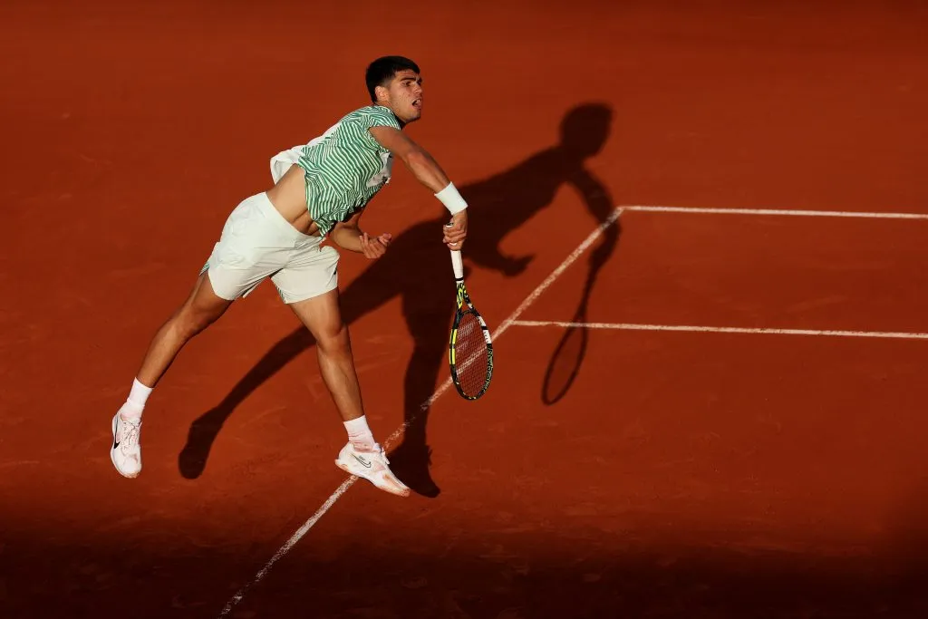 PARIS, FRANCE – MAY 29: Carlos Alcaraz of Spain serves against Flavio Cobolli of Italy during their Men’s Singles First Round Match on Day Two of the 2023 French Open at Roland Garros on May 29, 2023 in Paris, France. (Photo by Julian Finney/Getty Images)