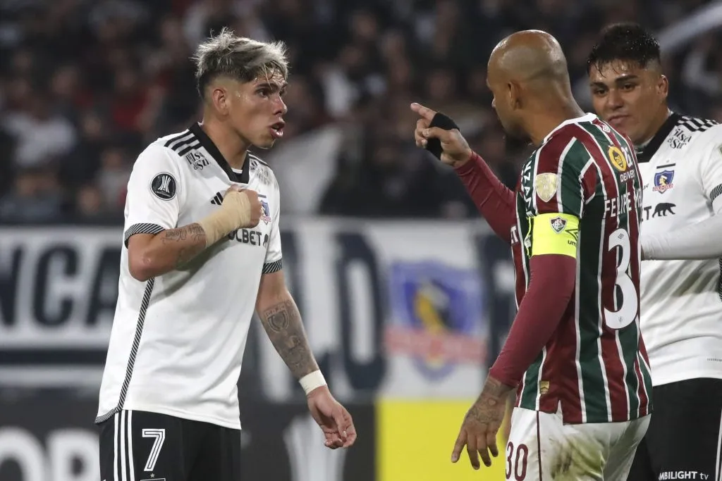 Felipe Melo tuvo una discusión con Carlos Palacios en el partido entre Colo Colo y Fluminense. (Foto: Jonnathan Oyarzún/Photosport)