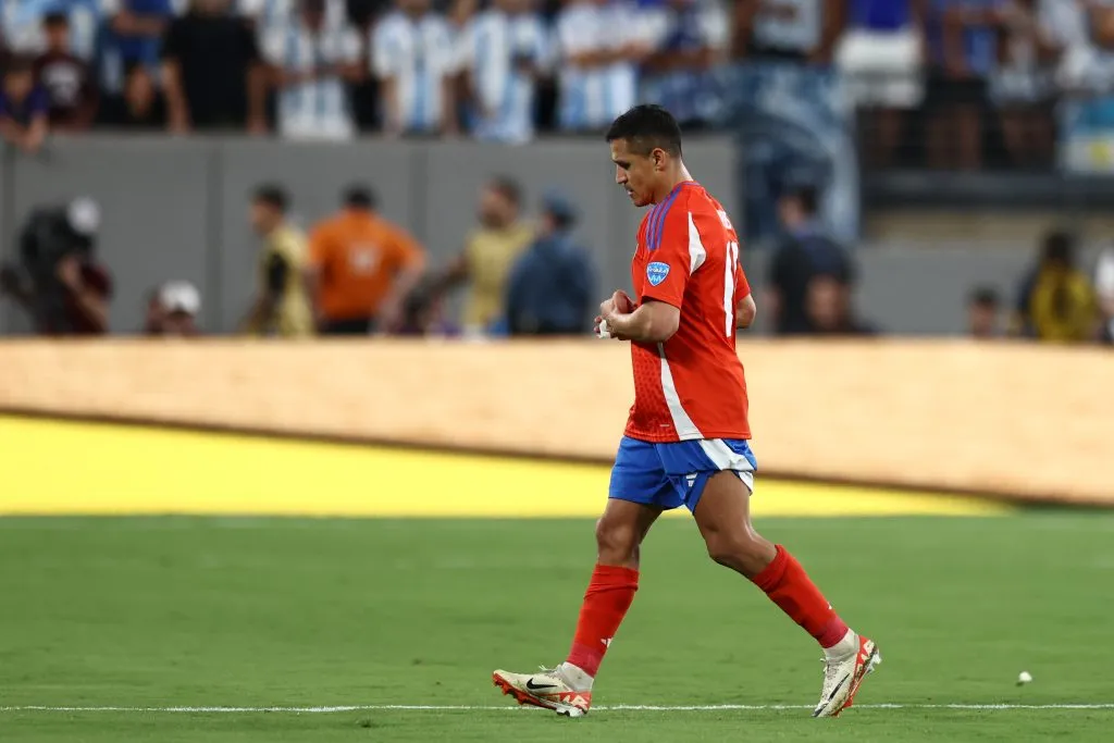 EAST RUTHERFORD, NEW JERSEY – JUNE 25: Alexis Sanchez of Chile walks out the pitch during the CONMEBOL Copa America 2024 match between Chile and Argentina at MetLife Stadium on June 25, 2024 in East Rutherford, New Jersey. (Photo by Tim Nwachukwu/Getty Images)