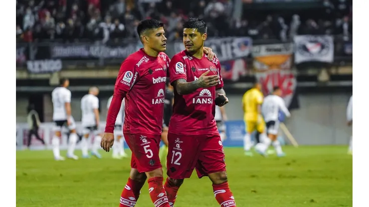Rafael Caroca y Patricio Rubio pasaron por la Universidad de Chile y no lograron mayores éxitos ante Colo Colo. Ahora, los dos jugadores, en Ñublense encontraron la fórmula para batir a los albos y matar la mufa que traían desde la U.