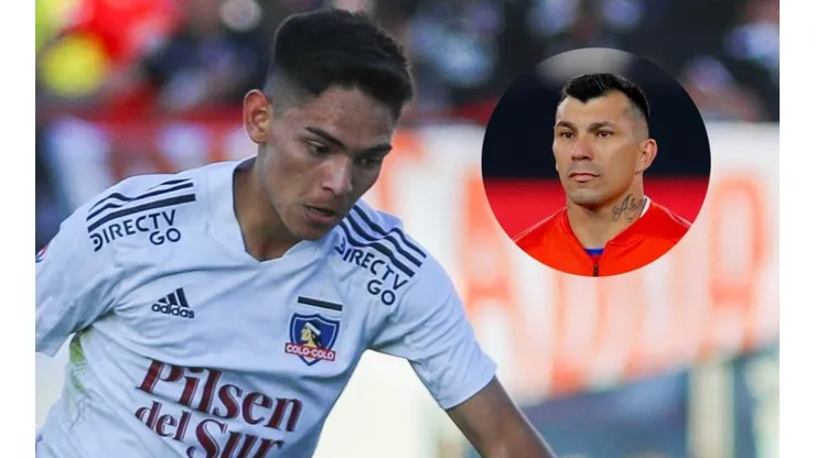 Gary Medel saluda al mediocampista de Colo Colo, Joan Cruz