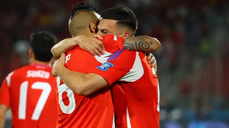 Cepeda y Vidal, en un fuerte abrazo.
