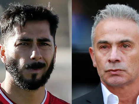 Campeón con la U le presta ropa a Johnny Herrera ante Juvenal Olmos