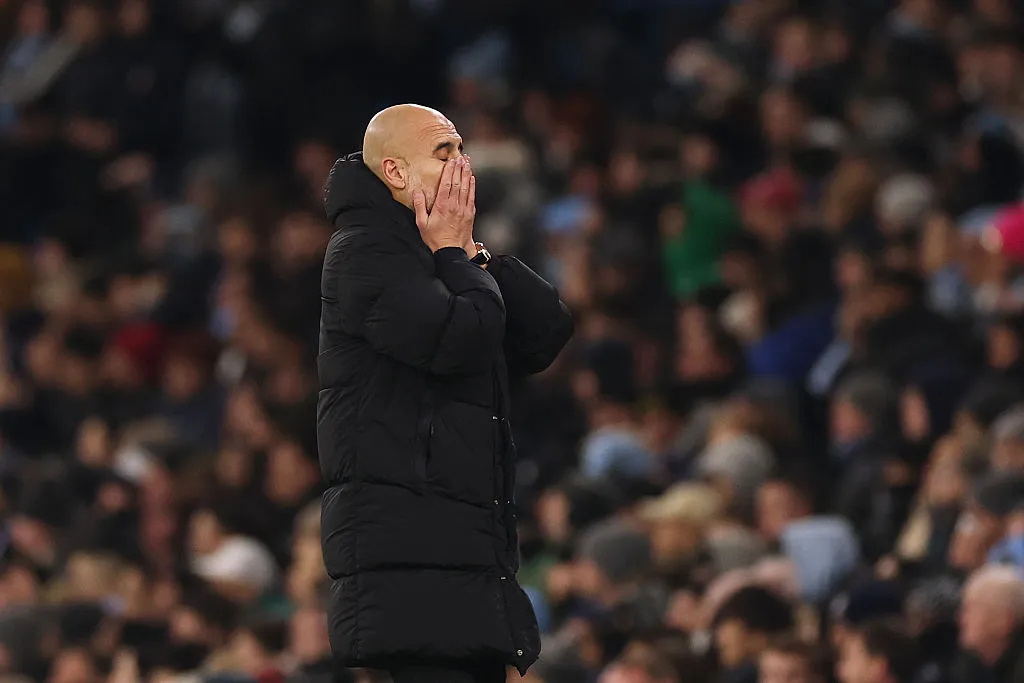 MANCHESTER, ENGLAND – JANUARY 04: Pep Guardiola, Manager of Manchester City, reacts during the Premier League match between Manchester City and Chelsea at Etihad Stadium on January 04, 2026 in Manchester, England. (Photo by Carl Recine/Getty Images)