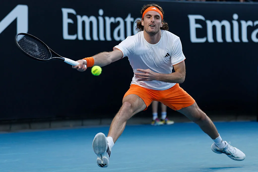 MELBOURNE, AUSTRALIA – JANUARY 22: Stefanos Tsitsipas of Greece plays a forehand against Tomas Machac of the Czech Republic in the Men’s Singles Second Round during day five of the 2026 Australian Open at Melbourne Park on January 22, 2026 in Melbourne, Australia. (Photo by Darrian Traynor/Getty Images)