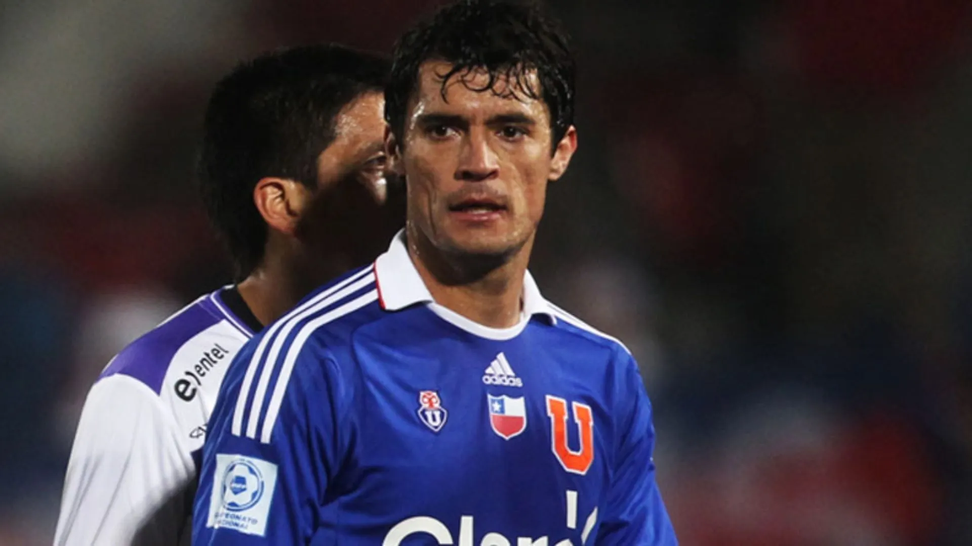 Marcos González apunto contra Fernando Gago en Universidad de Chile. (Imagen: Photosport)