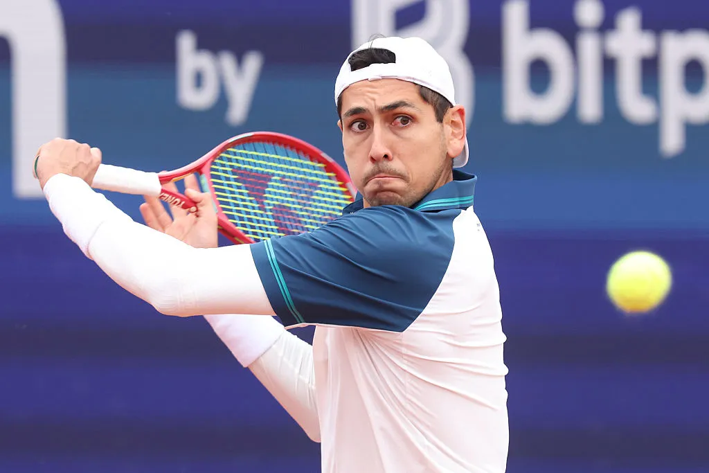 MUNICH, GERMANY – APRIL 14: Alejandro Tabilo of Chile plays a backhand against Joao Fonseca of Brazil during their Men’s Singles match on day four of the BMW Open at MTTC IPHITOS on April 14, 2026 in Munich, Germany. (Photo by Alexander Hassenstein/Getty Images for BMW)