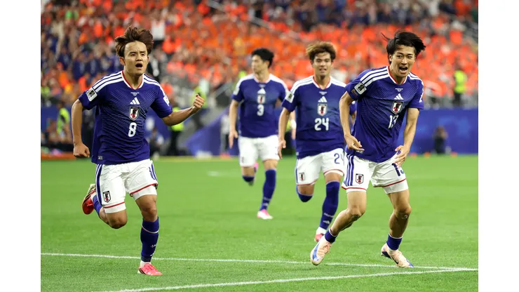 ARLINGTON, TEXAS - JUNE 14: Keito Nakamura #13 of Japan celebrates with teammates after scoring the team's first goal during the FIFA World Cup 2026 Group F match between Netherlands and Japan at Dallas Stadium on June 14, 2026 in Arlington, Texas. (Photo by Charlotte Wilson/Getty Images)