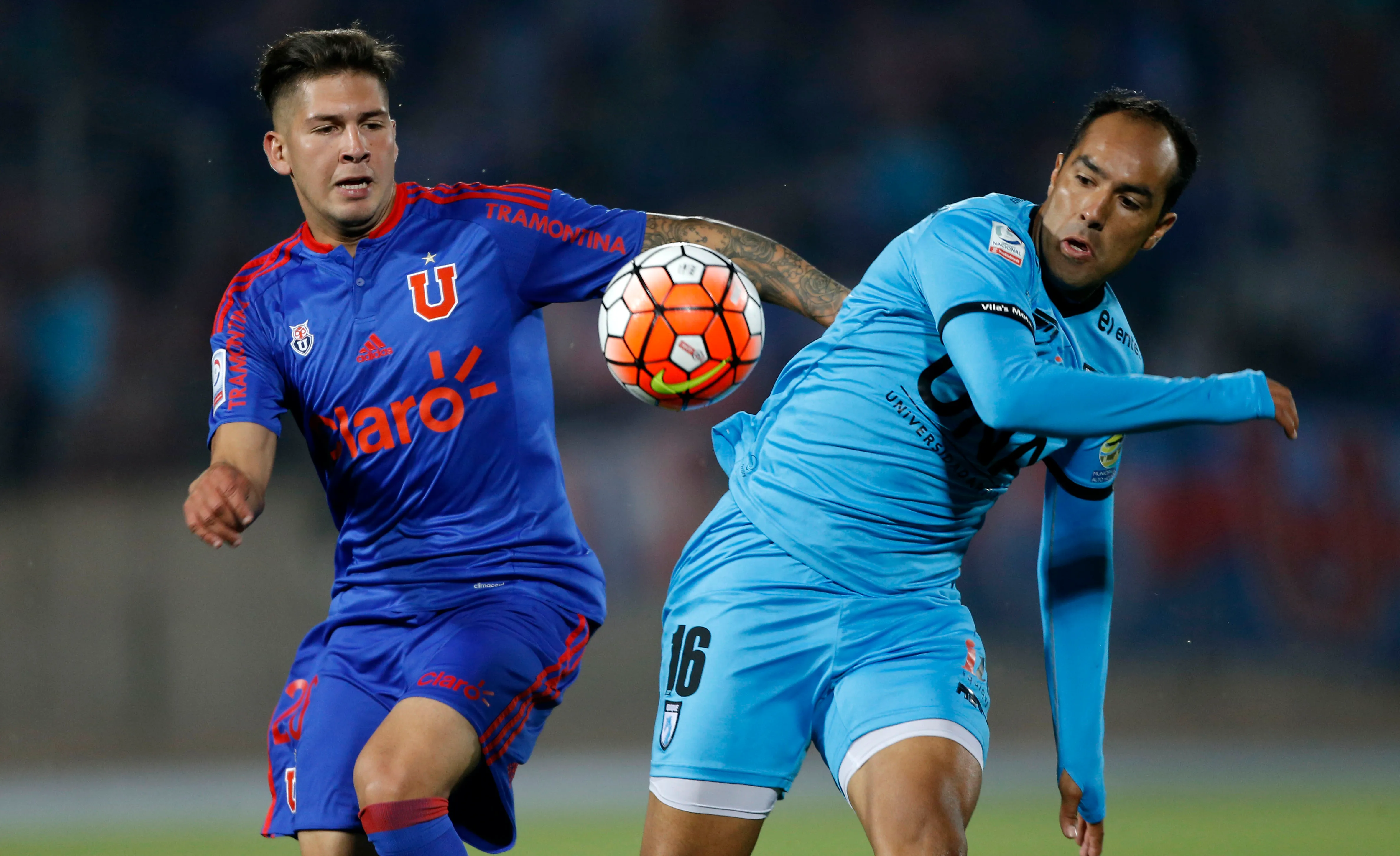 Bryan Taiva enfrentando a Deportes Iquique en su paso por la U | FOTO: Javier TorresPhotosport