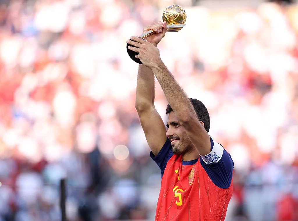 EAST RUTHERFORD, NEW JERSEY – JULY 19: Rodri #16 of Spain is presented with the Golden Ball award after the FIFA World Cup 2026 Final match between Spain and Argentina at New York New Jersey Stadium on July 19, 2026 in East Rutherford, New Jersey. (Photo by Carl Recine/Getty Images)
