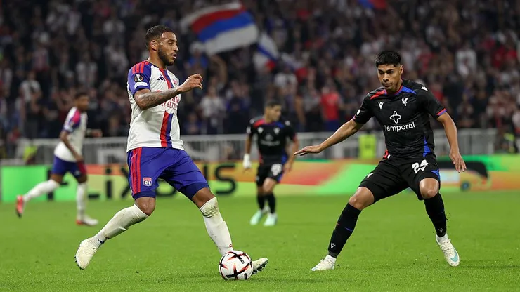DECINES-CHARPIEU, FRANCE - OCTOBER 15: Corentin Tolisso of Olympique Lyonnais runs with the ball under pressure from Dario Osorio of Crystal Palace during the UEFA Europa League 2026/27 League Phase MD2 match between Olympique Lyonnais and Crystal Palace FC at OL Stadium on October 15, 2026 in Decines-Charpieu, France. (Photo by Pauline Figuet/Getty Images)