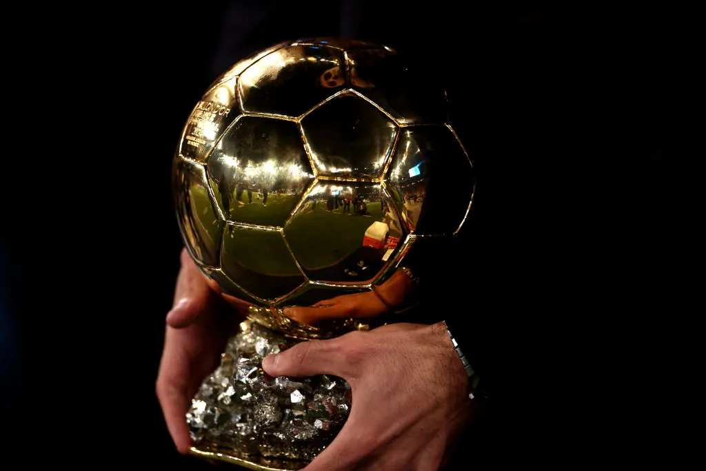 MANCHESTER, ENGLAND – NOVEMBER 23: Rodri of Manchester City holds his ballon d’or award prior to the Premier League match between Manchester City FC and Tottenham Hotspur FC at Etihad Stadium on November 23, 2024 in Manchester, England. (Photo by Naomi Baker/Getty Images)