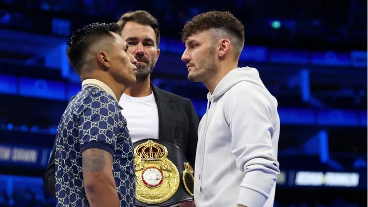 LONDON, ENGLAND - APRIL 01: Mauricio Lara (L) and Leigh Woods (R) face off alongside promoter, Eddie Hearn (C) for their upcoming fight at The O2 Arena on April 01, 2023 in London, England. (Photo by James Chance/Getty Images)