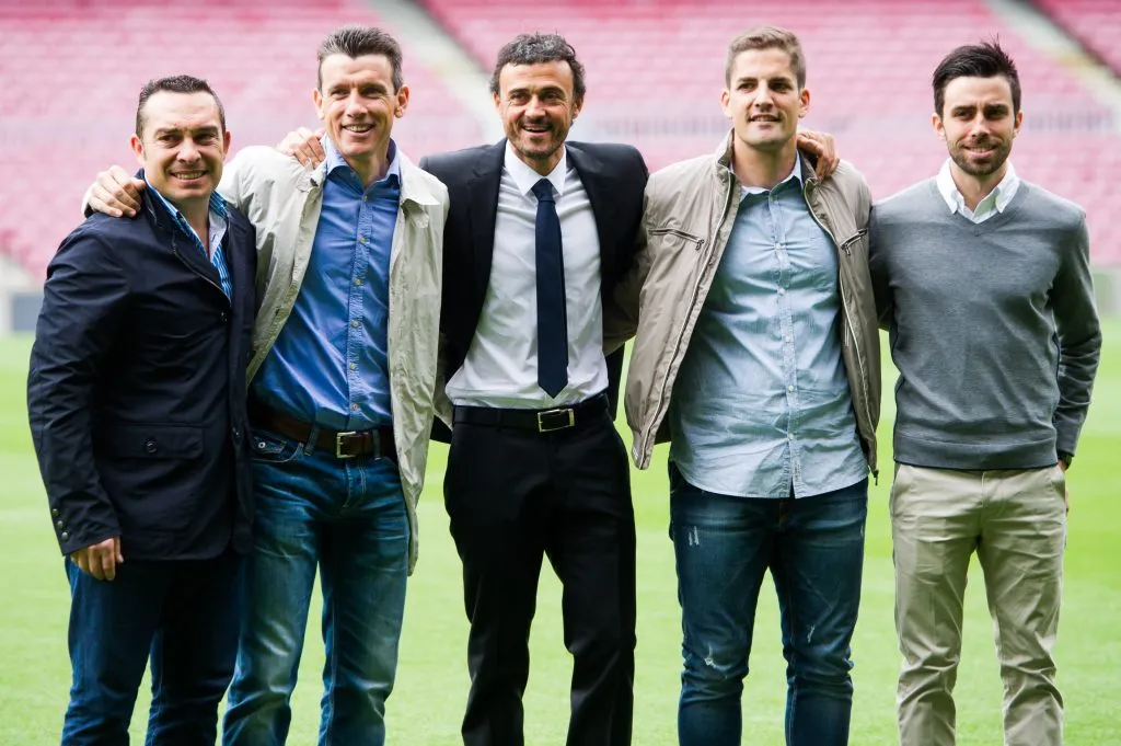 BARCELONA, SPAIN – MAY 21: Luis Enrique Martinez (C) poses for the media with members of his staff (L-R) Joaquin Valdes, Juan Carlos Unzue, Robert Moreno and Rafael Pol during his official presentation as the new coach of FC Barcelona at Camp Nou on May 21, 2014 in Barcelona, Spain. (Photo by Alex Caparros/Getty Images)