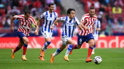 MADRID, SPAIN - MAY 28: Takefusa Kubo of Real Sociedad runs with the ball whilst under pressure from Mario Hermoso and Koke of Atletico Madrid during the LaLiga Santander match between Atletico de Madrid and Real Sociedad at Civitas Metropolitano Stadium on May 28, 2023 in Madrid, Spain. (Photo by Denis Doyle/Getty Images)