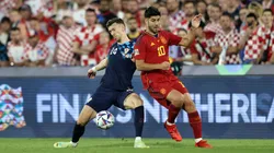 Perisic y Asensio luchan por la pelota en el último enfrentamiento.