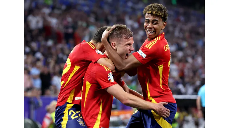 MUNICH, GERMANY - JULY 09: Dani Olmo of Spain celebrates scoring his team's second goal with teammate Lamine Yamal during the UEFA EURO 2024 Semi-Final match between Spain and France at Munich Football Arena on July 09, 2024 in Munich, Germany. (Photo by Alex Livesey/Getty Images)