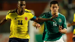 Luis Amaranto Perea y Javier Hernández, algunos de los protagonistas del último México vs. Colombia.