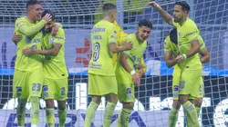 América celebrando una durísima goleada estampada contra Cruz Azul.
