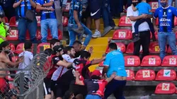 Violencia en las tribunas del estadio La Corregidora.