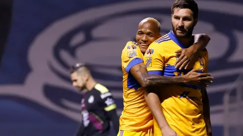 Luis Quiñones y André-Pierre Gignac.