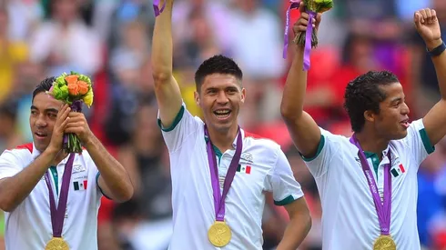 Marco Fabián, Oribe Peralta y Giovani dos Santos con el oro de Londres 2012