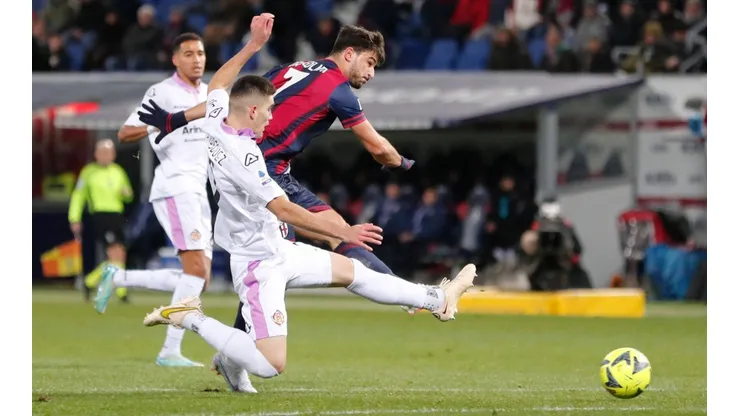 January 23, 2023, BOLOGNA, Italy: Bologna s Riccardo Orsolini (R) and Cremonese s Johan Vasquez (L) in action during the