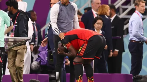 Al Rayyan, Qatar, 1st December 2022. Assistant coach Thierry Henry consoles Romelu Lukaku of Belgium during the FIFA Wor