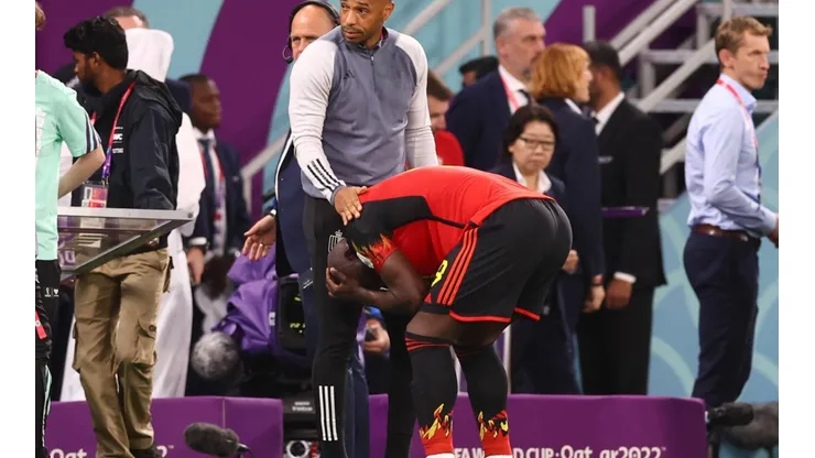 Al Rayyan, Qatar, 1st December 2022. Assistant coach Thierry Henry consoles Romelu Lukaku of Belgium during the FIFA Wor