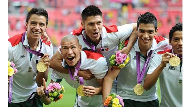 Rodríguez, Enríquez, Peralta, Jiménez y Aquino con el oro de Londres 2012.