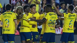 Los jugadores de América, a puro festejo.