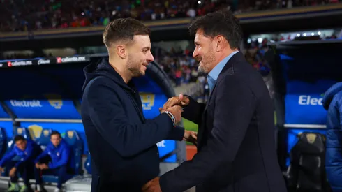 Anselmi y Lema, fuerte apretón entre compatriotas.