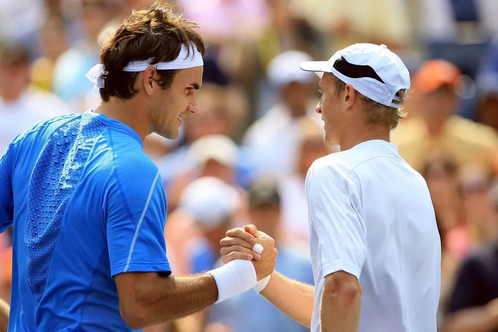 Nikolai Davidenko y Roger Federer (Getty Images)