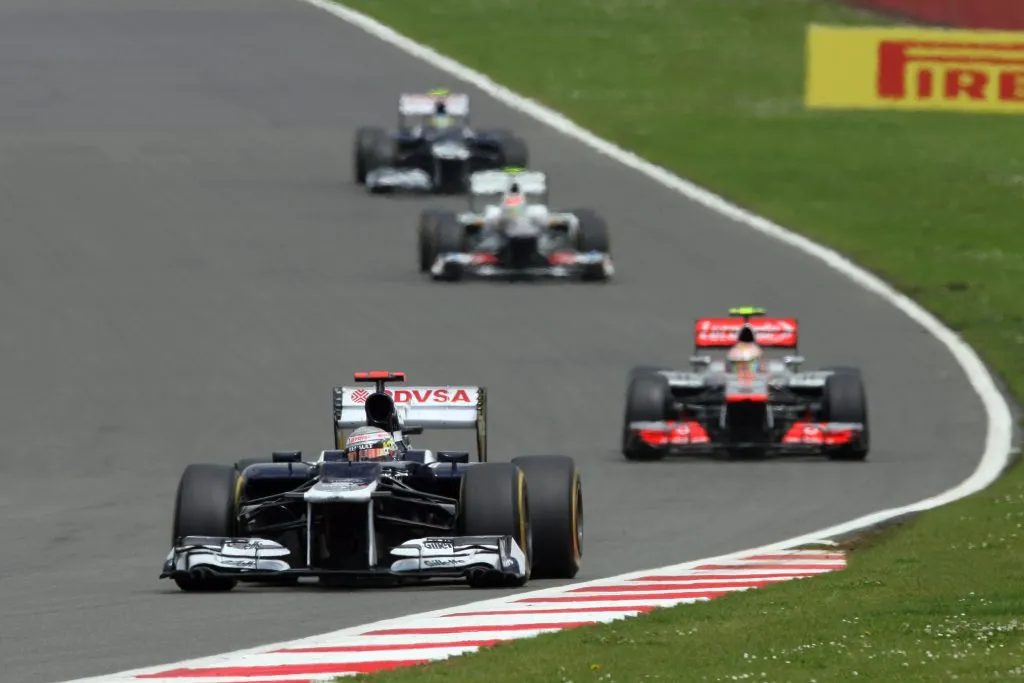 Autos corriendo en Grand Prix