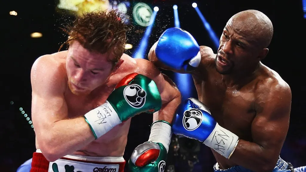 Floyd Mayweather y Canelo Álvarez se enfrentaron en el año 2013. (GETTY IMAGES)