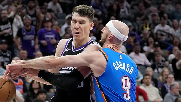 Jake LaRavia y Alex Caruso.