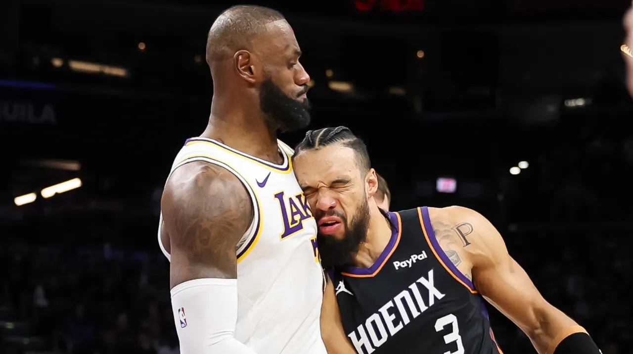 LeBron James y Dillon Brooks en Lakers vs. Suns. (Foto: Getty Images)