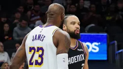 LeBron James y Dillon Brooks en la victoria de Lakers ante Suns.