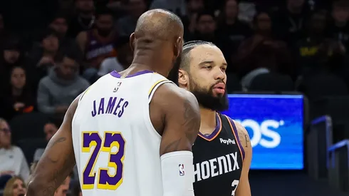 LeBron James y Dillon Brooks en la victoria de Lakers ante Suns.
