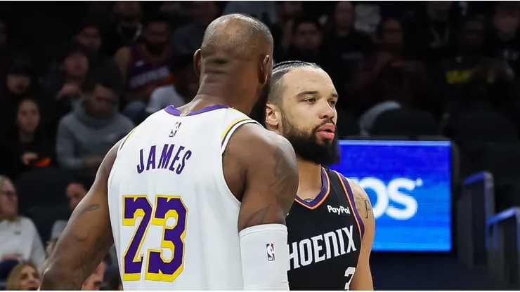 LeBron James y Dillon Brooks en la victoria de Lakers ante Suns.