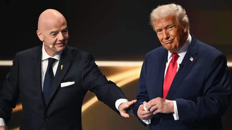 WASHINGTON, DC - DECEMBER 05: U.S. President Donald Trump draws during the FIFA World Cup 2026 Official Draw at John F. Kennedy Center for the Performing Arts on December 05, 2025 in Washington, DC. (Photo by Mandel NGAN - Pool/Getty Images)
