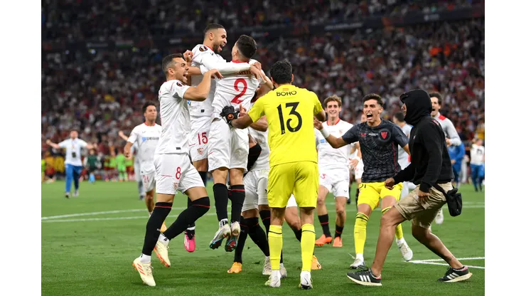 BUDAPEST, HUNGARY - MAY 31: Sevilla FC players celebrate after the team's victory in the penalty shoot out during the UEFA Europa League 2022/23 final match between Sevilla FC and AS Roma at Puskas Arena on May 31, 2023 in Budapest, Hungary. (Photo by Justin Setterfield/Getty Images)