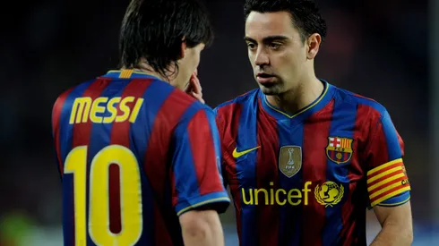 BARCELONA, SPAIN - APRIL 28: Xavi of Barcelona talks to team mate Lionel Messi during the UEFA Champions League Semi Final Second Leg match between Barcelona and Inter Milan at Camp Nou on April 28, 2010 in Barcelona, Spain. (Photo by Michael Regan/Getty Images)